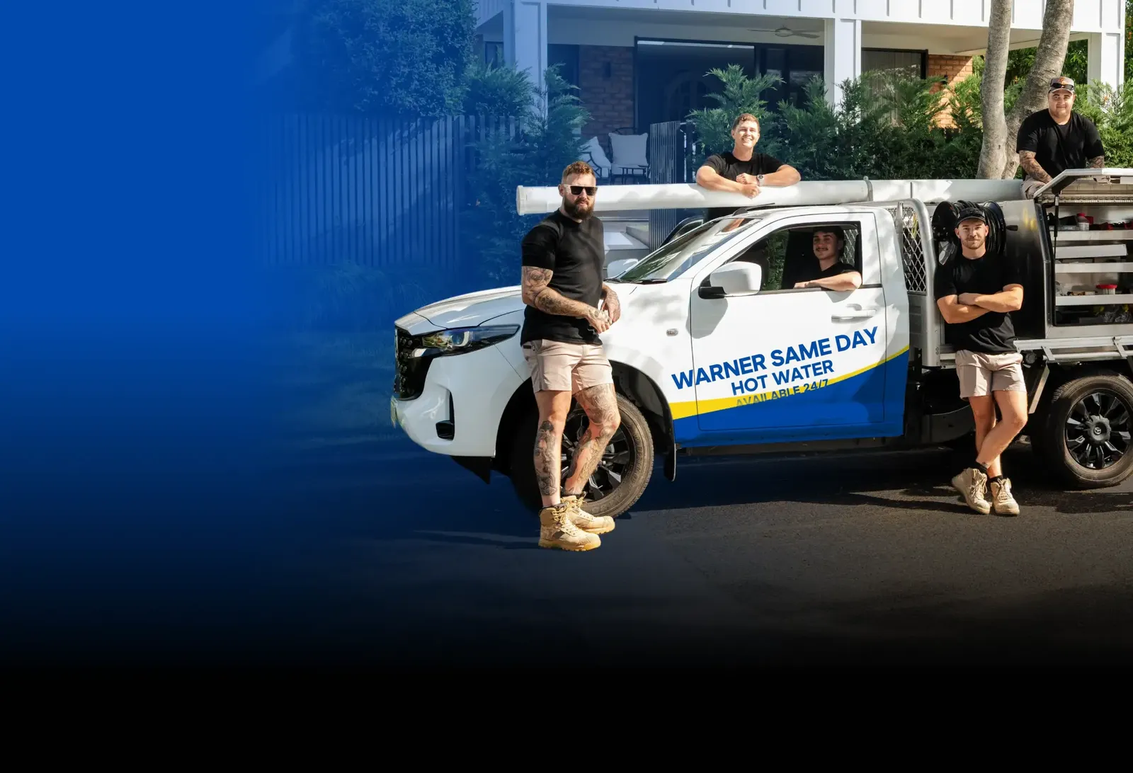 Warner Same Day Hot Water team with the ute
